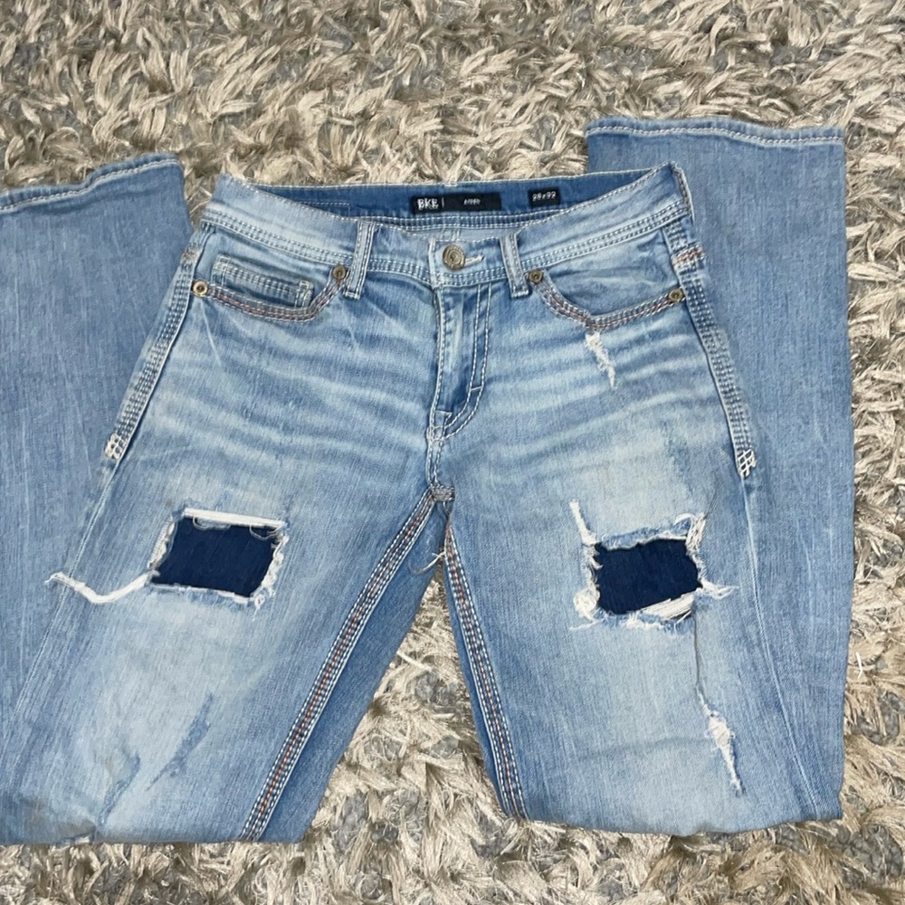 Buckle boys jeans size 28 x 32. They look like the fit is straight.